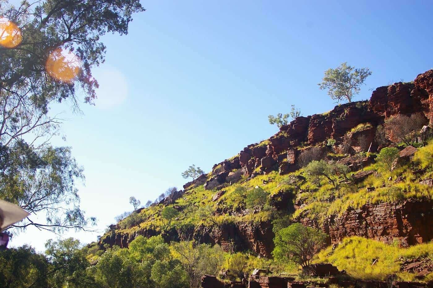 A deep gorge with layered red rock walls in Karijini National Park